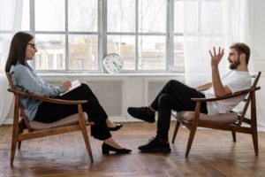 Two people talking in an office